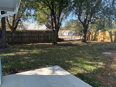 View of fenced backyard
