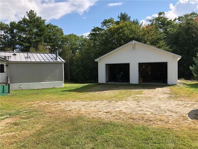 The two-car garage sits right beside...