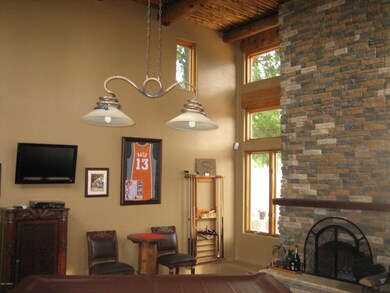 Family Room With Stacked Stone Fireplace