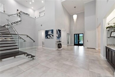Large open entryway, stairs to second floor