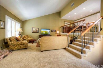 Living room from entry way custom wood shutters th