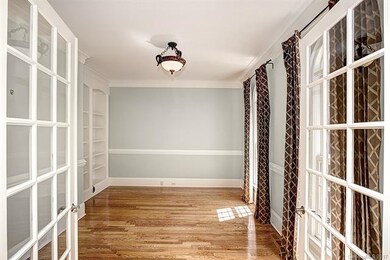 Office with French Doors and Custom Built-ins.  Wi