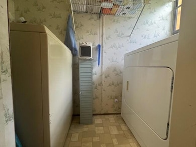 #7- Laundry room off bathroom