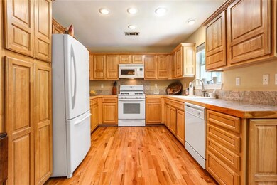 Galley kitchen with view to the backyard.