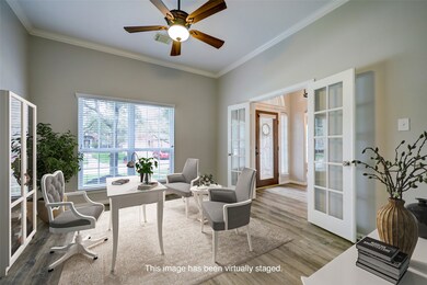 This spacious study has plenty of room for all of your personal touches. This photo has been virtually staged.