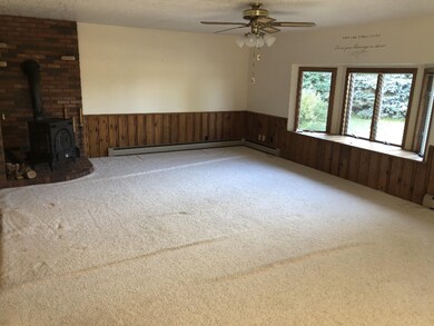Family room with wood fireplace