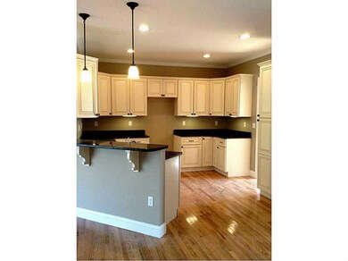 Kitchen. Glazed maple cabinetry with granite count