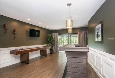 LIVING ROOM/ GAME ROOM OFF POOL AREA
