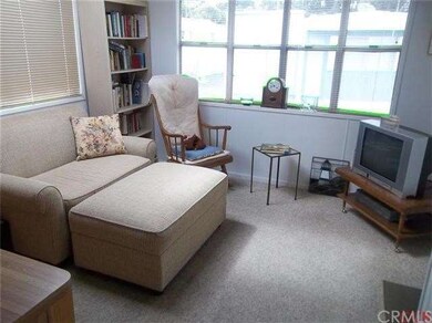 Comfortable living room  Park has cable available.