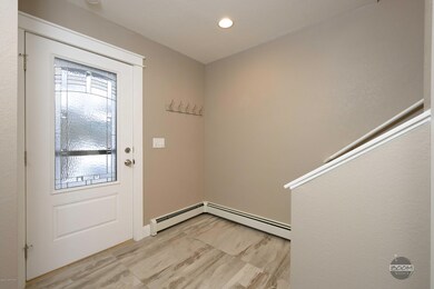 Large entryway with Italian tile