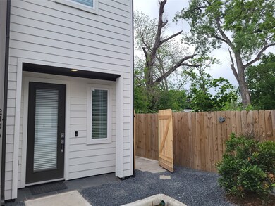 A closer view of the front door. The gate on the r