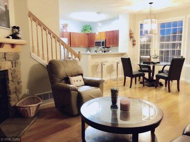 Living room view to the kitchen and dining