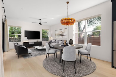 Dining area featuring light wood-style floors, pl