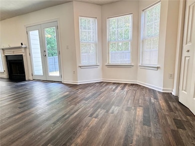 Unfurnished living room featuring a fireplace with
