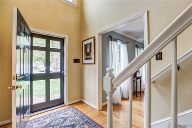 Two-Story Foyer with Arched Window at Second Level