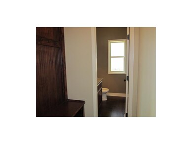 MUD ROOM INTO HALF BATH