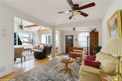 Entry foyer, sitting room and living room