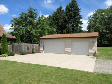 The 36x24' three-car detached garage and 36x30' ce