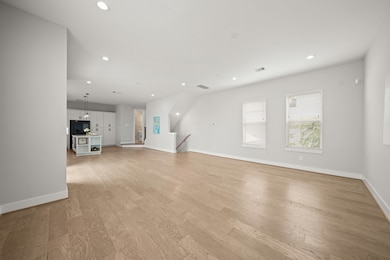 With wide plank hardwood flooring throughout, it adds warmth and elegance to the space.