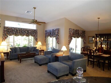 GREAT ROOM FEATURES SOARING CEILINGS