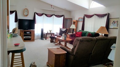 VIEW OF LIVING ROOM FROM HALLWAY