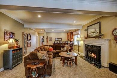 Spacious Family Room with Gas Fireplace opens off 