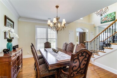 Open Dining room with hardwood floors