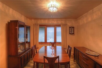 The Dining Room features hardwood floor under the 