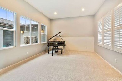 Formal Living Room with high ceiling and view of t
