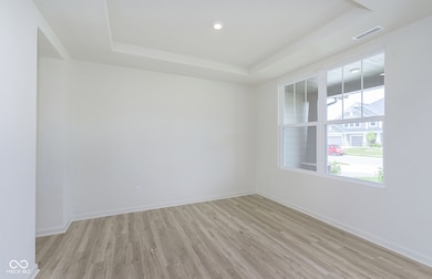Photo of Similar Dining Room with Tray Ceiling