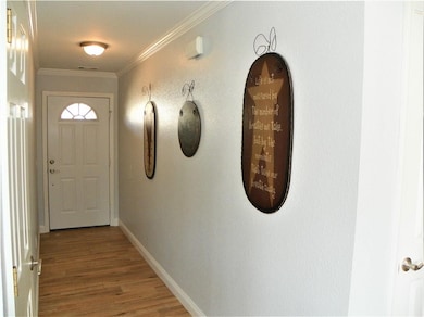 This 14ft. Foyer is a fabulous place for your fun furniture or wonderful wall decor'.