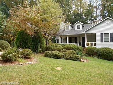 Exterior Front. Beautiful landscaped yard with tons of bulbs in spring