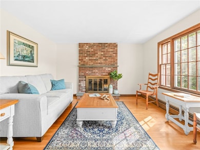 Living room with brick fireplace