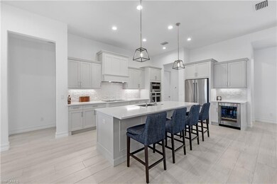 14265 Laguna Springs Ln, Naples, FL 34114 - photo 4