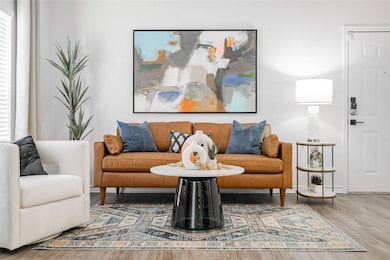 Living room featuring hardwood / wood-style floors