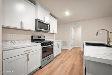 669 Grand Reserve Dr, Bunnell, FL 32110 - photo 7