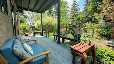 COVERED TREX DECK OVERLOOKS COURTYARD