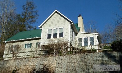 Rear View of Home: View from lower tier of backyar