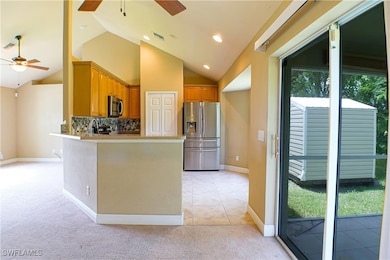 Kitchen with appliances with stainless steel finis