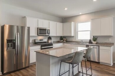 ***Photos From Previously Built Ibis Home***  The Kitchen is the heart of the home, and this one will not disappoint. We have included white cabinetry, quartz countertops, 3