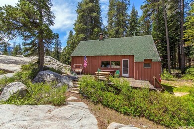 Peaceful location with lake access from this rustic cabin. 2 bedrooms, kitchen, dining, living area on bottom floor and 2 lofts.