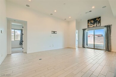 Living room with surround sound and 12' ceilings