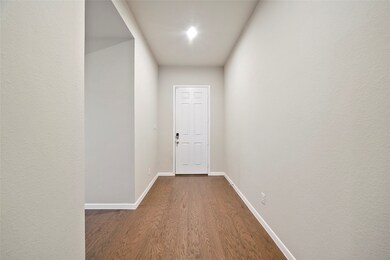 The homes foyer features lovely flooring, a great neutral color palette and recessed canned lighting.