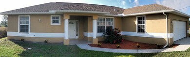 1242 Cellini St E, Lehigh Acres, FL 33974 - photo 2