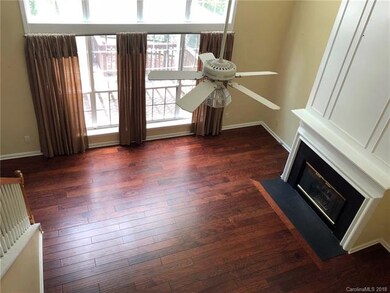 2-story great room w/ fireplace.