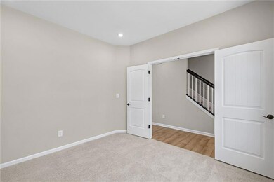 Carpeted spare room with recessed lighting, basebo