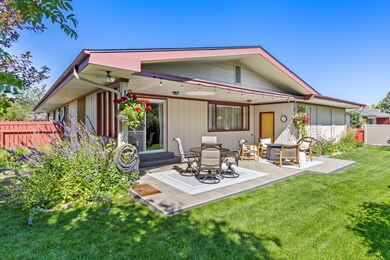 Back of house with a patio