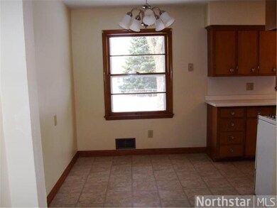 Eat-in dining overlooking the back yard.  New viny