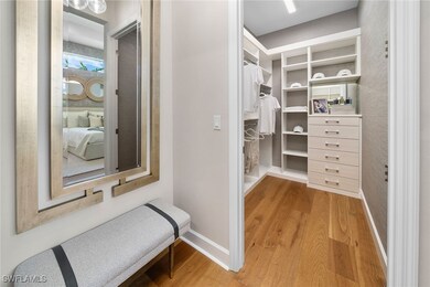 Walk in closet featuring wood finished floors
