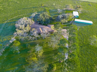 Aerial View of the House and Barns.